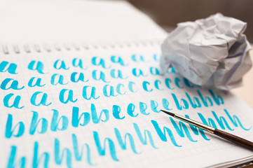 Hand drawn lettering background. Lettering brush calligraphy on paper