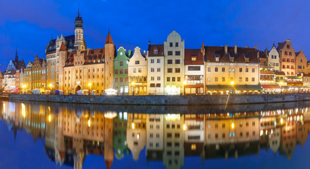 Fototapeta na wymiar Panorama of Old Town of Gdansk, Dlugie Pobrzeze and Motlawa River at night, Poland