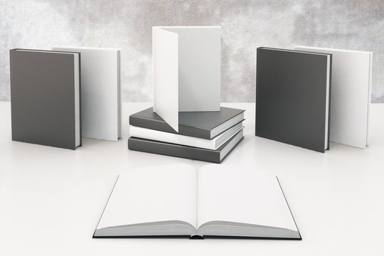 Study concept with opened book with blank white pages and other