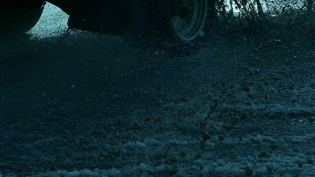drive  cars through puddles movement of traffic and snow Spring video slow motion