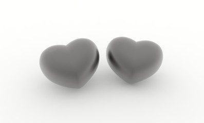 2 dunkele Metal Herzen