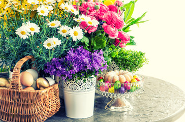 Easter decoration with flowers, eggs and cake. Vintage style