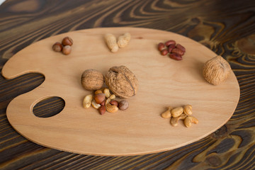 Assorted nuts on the palette - healthy food