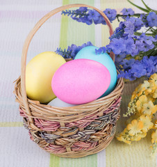 Colored Easter Eggs in a Basket