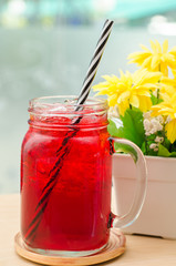 Ice red drink in the glass