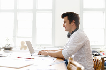 Fototapeta premium Young businessman in office