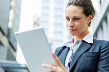 Portrait of business woman smiling outdoor