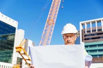 Engineer builder at construction site