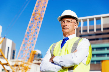 Engineer builder at construction site
