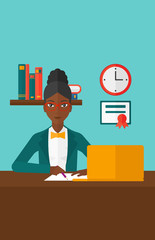 Woman using laptop for education.