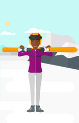 Woman holding skis.