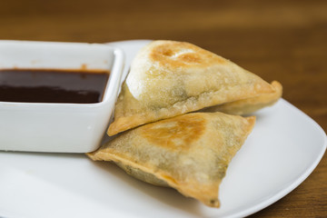 Samosas and Dipping Sauce Plate Closeup