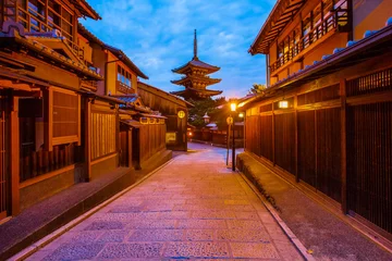 Zelfklevend Fotobehang Japanese pagoda and old house in Kyoto at twilight © torsakarin