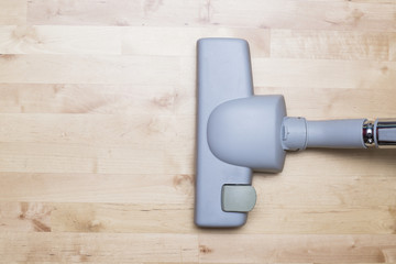 Vacuum cleaning on the parquet floor