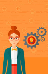 Woman with bulb and gears.