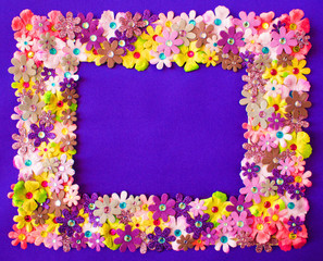 Multi colored flowers with rhinestones on a purple satin background. Great for party invitations ,thank you notes or stationary