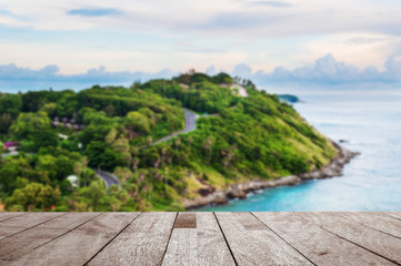 Wood table top on blurred blue sea and island view point in morn