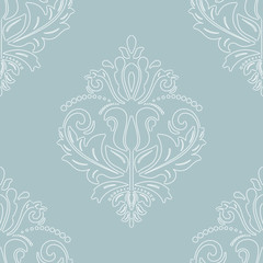 Damask seamless ornament. Classic oriental white pattern and light blue background