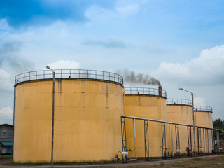 Metal oil tanks in Palm oil refinery plant .