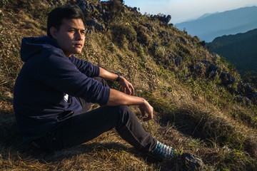 Man sitting on the mountain