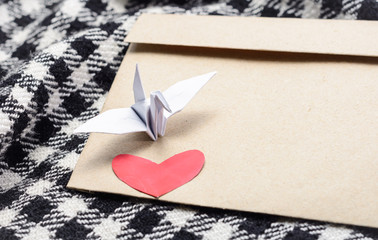 heart and paper bird