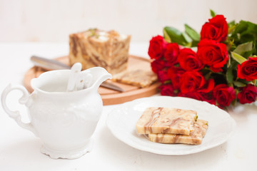 creamy fondant with a shredded nut on a plate, selective focus
