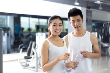 young people working out in modern gym