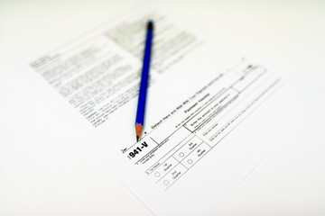Tax Form 941-V on White Background