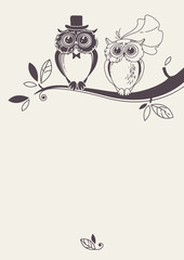 Obraz premium Template card with owls on a tree branch. Greeting card.