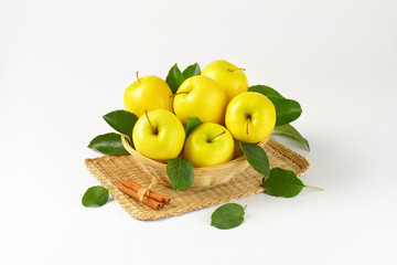 basket of yellow apples