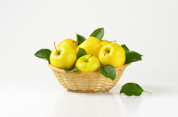 basket of yellow apples