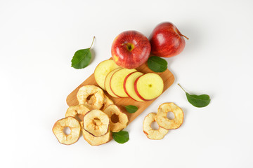 two whole apples and dried apple rings