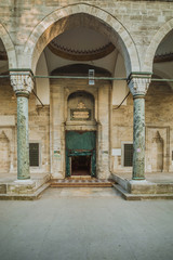 Naklejka premium Entrance to the hall of Old mosque in Istanbul city