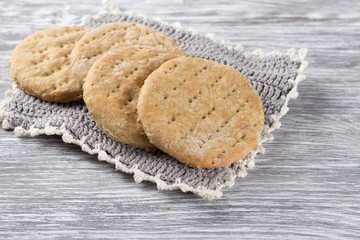 Homemade oat wheat flat bread on the wooden table