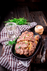 Homemade meat roll on iron pan.