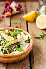 chicken salad with cheese and pomegranate