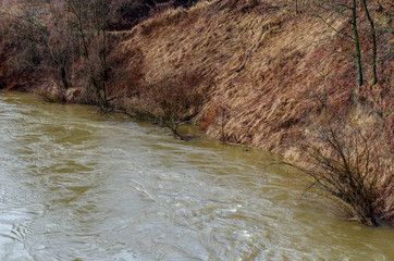 View from the Riverwalk in Chernyakhovsk, Russia of the Angrapa River as it reaches flood levels after several days of non-stop rainy weather.