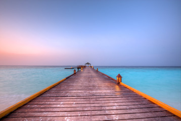 Fototapeta premium Wooden jetty in sunset
