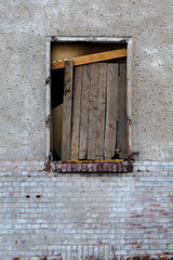 Old dirty window on old dirty wall