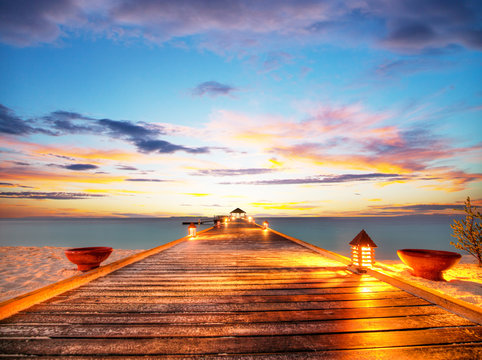 Wooden Jetty In Sunset