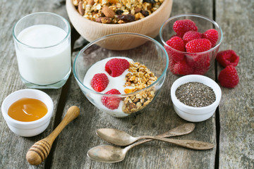 healthy snack - granola on wooden surface