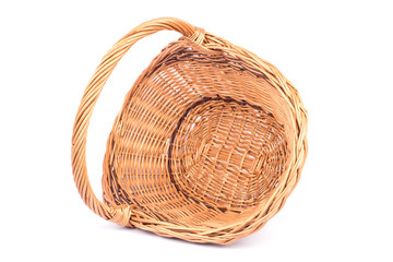 Obraz premium Empty wicker basket isolated on white