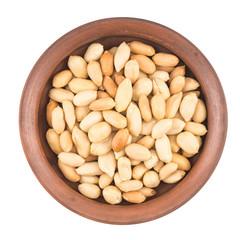 roasted peanuts in a bowl on a white background isolated