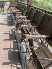 Old movie theater seats. Wood chairs