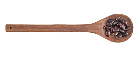 kidney beans on a wooden spoon isolated on white background