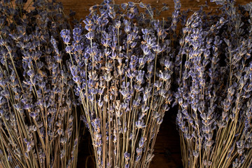 Dried lavender bunch on a wooden table.