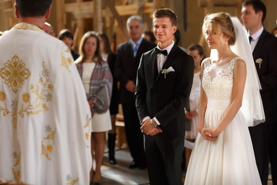 classic wedding ceremony of stylish young luxury bride and groom