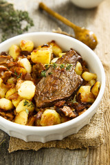 Beef steak with potato and mushrooms