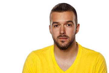 Fototapeta premium young handsome man in yellow shirt