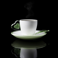 white Cup of coffee isolated on  dark background
